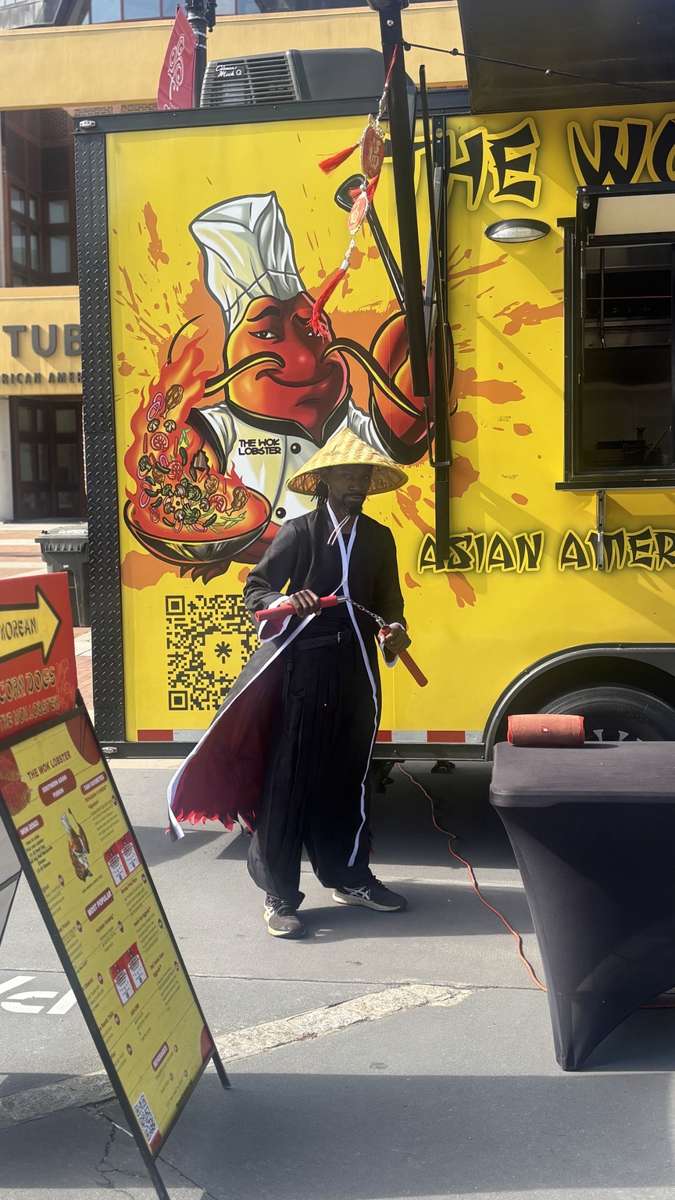The Wok Lobster yellow branded food truck